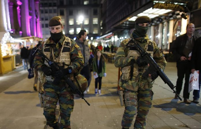 Belgium soldiers patrol in the Brussels Christmas market