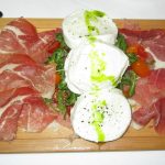 Prosciutto Santa Danielle y Burrata fresca y tomates cherry