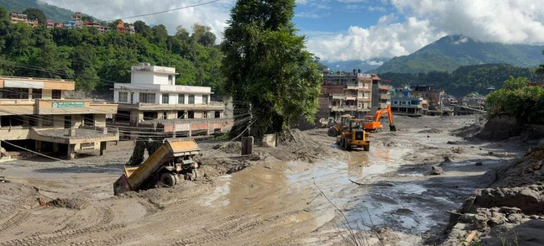 © UNICEF/Laxmi-Prasad-Ngakhusi Buildings in Bagmati Province, Nepal, remain covered in mud after a devastating flash flood.
